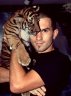 Balázs Buzás with a Tiger (<em>Panthera tigris</em>) juv., Si Racha Tiger Zoo, THAILAND
