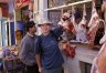 Balazs Buzas and Moumen Nourdinne near the butcher’s shop, Moulay Ibrahim, MOROCCO