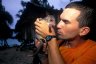 Balázs Buzás with 2 months old Grey Dorcopsis (<em>Dorcopsulus luctuosa</em> ?), Old Musu, ~ 23 km SW of Vanimo, PAPUA NEW GUINEA. Photo: Ákos Steiger