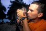 Balázs Buzás with 2 months old Grey Dorcopsis (<em>Dorcopsulus luctuosa</em> ?), Old Musu, ~ 23 km SW of Vanimo, PAPUA NEW GUINEA. Photo: Ákos Steiger