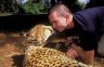 Balázs Buzás with a 6 years old female Cheetah (<em>Acinonyx jubatus</em>), Safari Walk, Nairobi National Park, KENYA. Photo: Eszter Gulyás