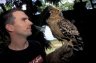 Balazs Buzas with Brown Fish Owl (<em>Ketupa zeylonensis</em>), Bali Bird Park, Bali, INDONESIA. Photo: Eszter Gulyas.