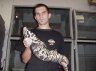 <p>Balázs Buzás with Argentine Black and White Tegu (<em>Tupinambis merianae</em>), Deerfield Beach, FL, USA. Photo: Csaba Görgényi</p>