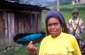 <p>Dani woman with trade-skin of the Superb Bird of Paradise (<em>Lophorina superba</em>) male, Pukam (2140 m), Baliem Gorge, Papua, Indonesia</p>