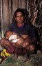 <p>Dani woman with children, Pukam (2140 m), Baliem Gorge, Papua, INDONESIA</p>