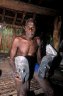 Local man with his woodcarvings, Kandangai, Middle Sepik River, PAPUA NEW GUINEA