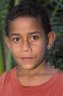 9 years old boy near the suspension bridge over Wainisairi River, Lavena Coastal Walk, Ravilevo Coast, Taveuni, FIJI