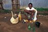 Local women is selling homemade alcoholic drink (