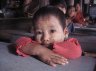 Bamar kid in Bagaya Kyaung, Inwa (Ava), near Mandalay, MYANMAR (BURMA)